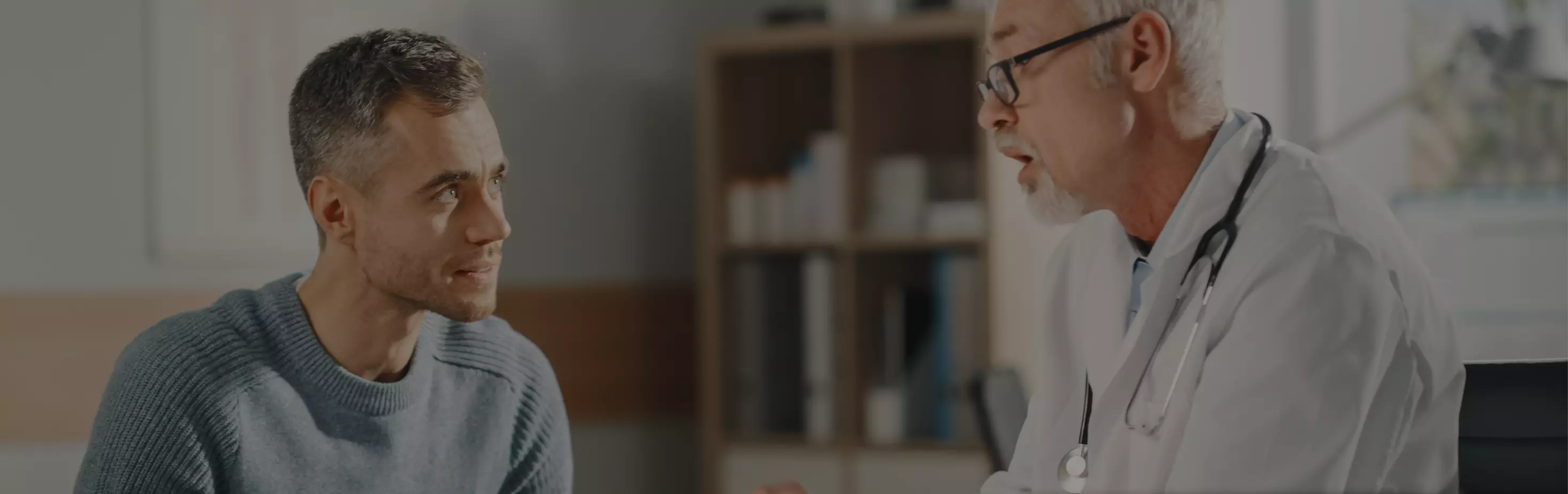 doctor meeting with male patient