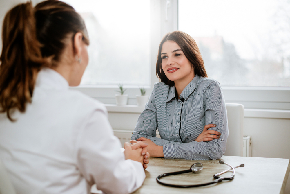 woman talking to doctor